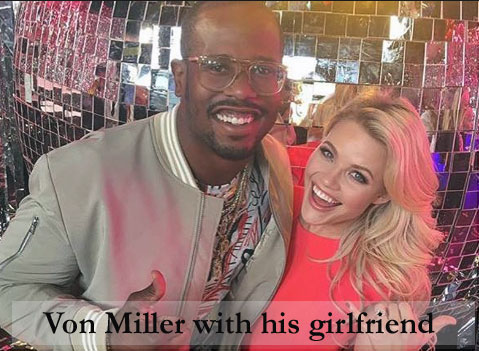 Miller with his girlfriend