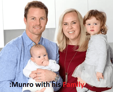 Colin Munro with his wife and children