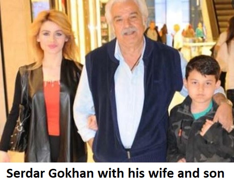 Serdar Gokhan with his wife and child