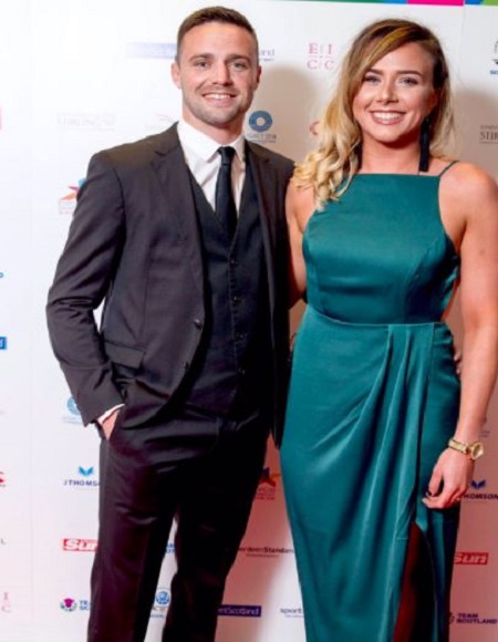 Josh Taylor with his girlfriend
